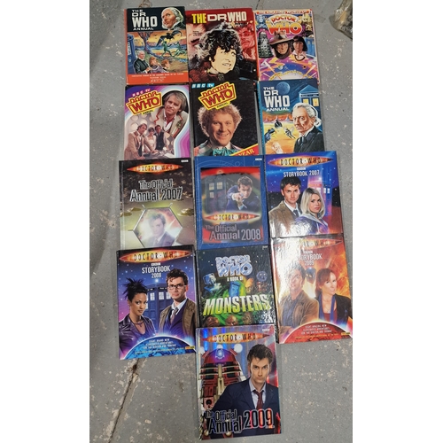 736 - Lot of Doctor Who Annuals (1960's onwards)  Books and 2 Cyberman Egg Cops and Spoons.