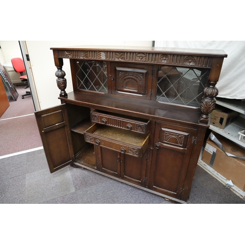 751 - Antique dark wood sideboard 5 cupboards and 2 drawers with leaded glass and carved finish (51