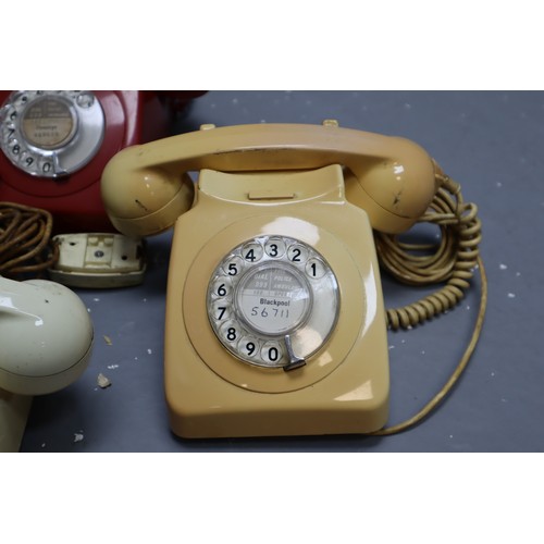 479 - Four vintage rotary telephones (grey one is wall mounted)