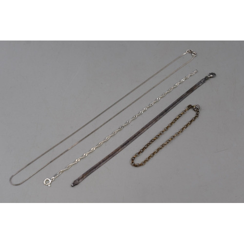 32 - A Selection of Four Sterling Silver Necklace and Bracelet Chains, In Presentation Box