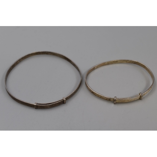 248 - Two Adjustable Etched Silver Bangles