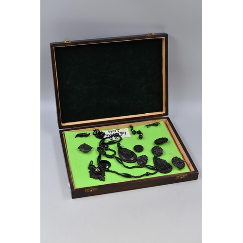 251 - Fourteen Pieces of Victorian Jet Hand Carved Jewellery Pieces in Wooden Display Box, Used As Example... 