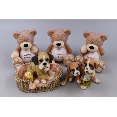 254 - Three Fudgy bear figurines, a Leonardo collection Home sweet home figurine and a Boxer puppies with ... 