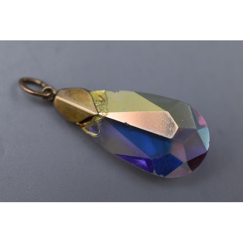 63 - A 9ct Gold Topped Teardrop Stoned Pendant, AF