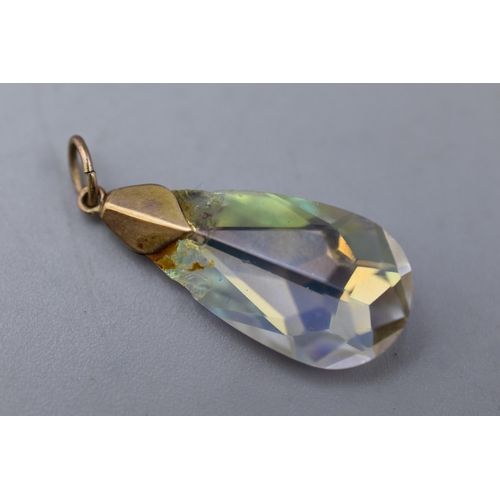 63 - A 9ct Gold Topped Teardrop Stoned Pendant, AF