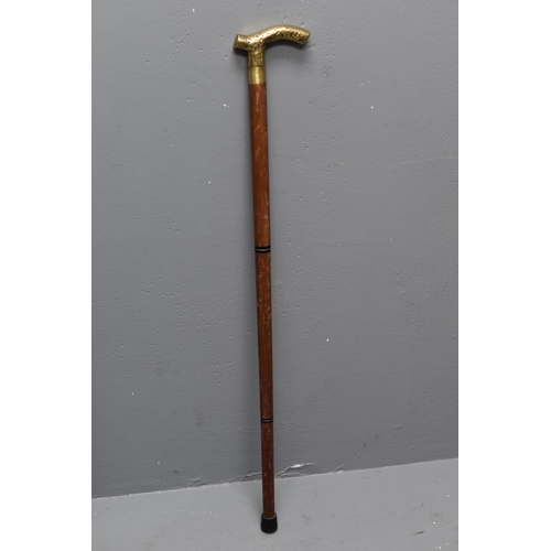 322 - A Three Part Brass Handled Walking Stick, With Hidden Flask