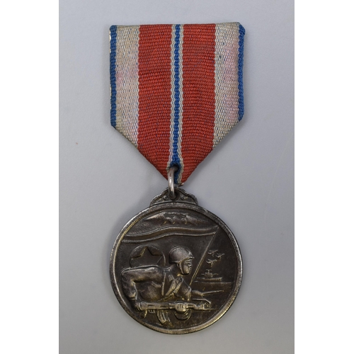 269 - North Korean Medal With Ribbon