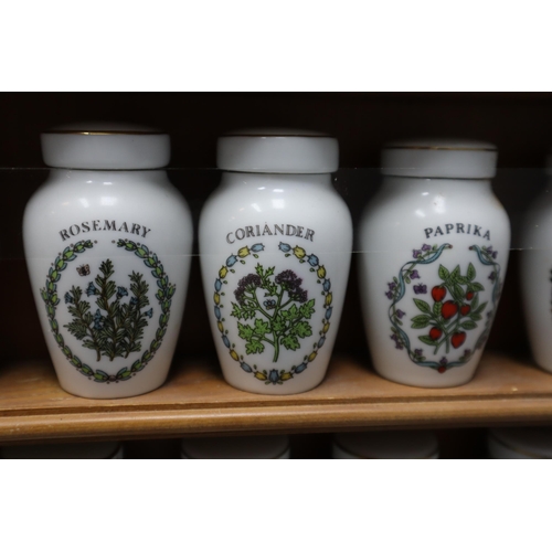 330 - Set of 24 Gloria Concepts Inc The Franklin Mint porcelain spice jars on a shelf. No Postage