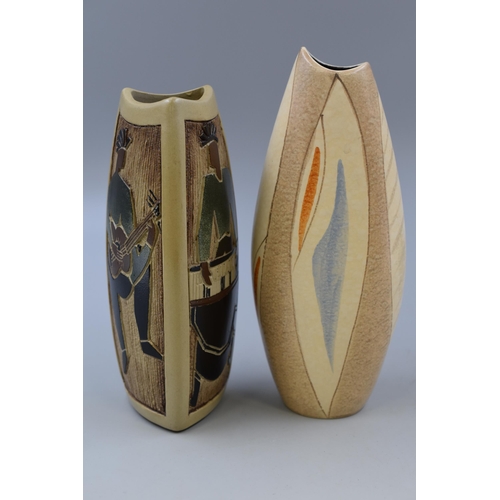 273 - Two 1960's abstract vases one with an abstract design and Latin musical theme design (tallest 8