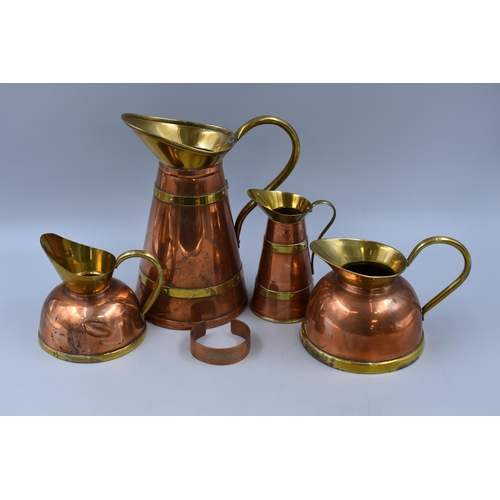 352 - A Selection of Copperware to include Four Jugs and a Copper Bangle