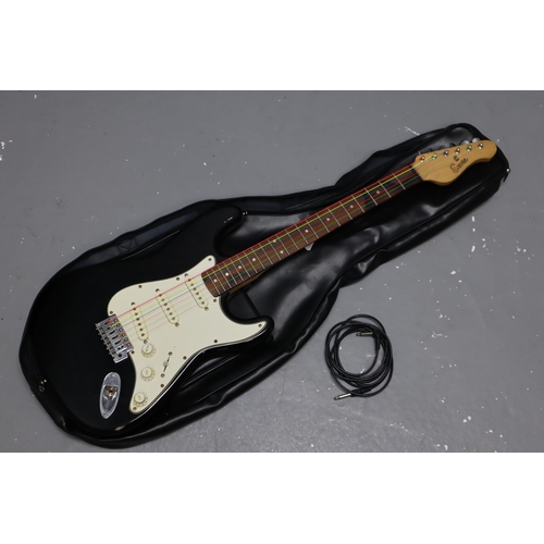 562 - An Encore Strat Style Electric Guitar, In JSH Guitar Bag With Jack. Encore Has Coloured Practice Str... 