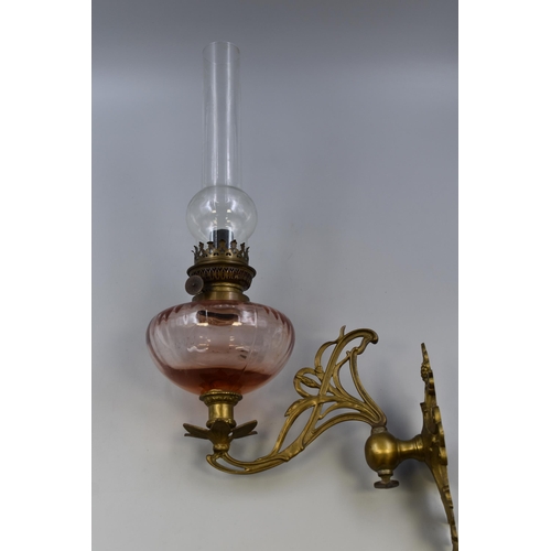 357 - A Brass and Rose Glass Art Nouveau Style Wall Mounted Oil Lamp, With Shade. Not Converted To Electri... 