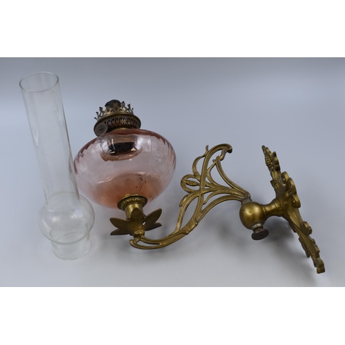 357 - A Brass and Rose Glass Art Nouveau Style Wall Mounted Oil Lamp, With Shade. Not Converted To Electri... 