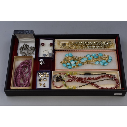 175 - Selection of jewellery to include necklaces, a bracelet and earrings all completed in presentation b... 