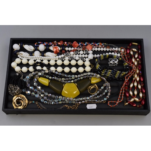 181 - A Selection of Vintage Designer Jewellery To Include Beaded Necklaces, Scarf Clip, Bracelets, And Mo... 