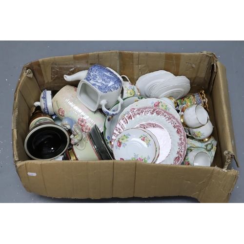 587 - Mixed lot to include ceramic items such as teapots, plates, side plates, saucers, cups and more