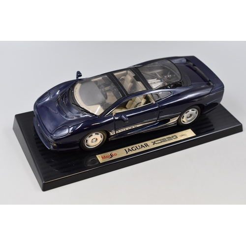 192 - Maisto Diecast Model, 1992 Jaguar XJ 220 (Unboxed ) In Mirror Blue, Scale 1:18, Opening Doors On Dis... 