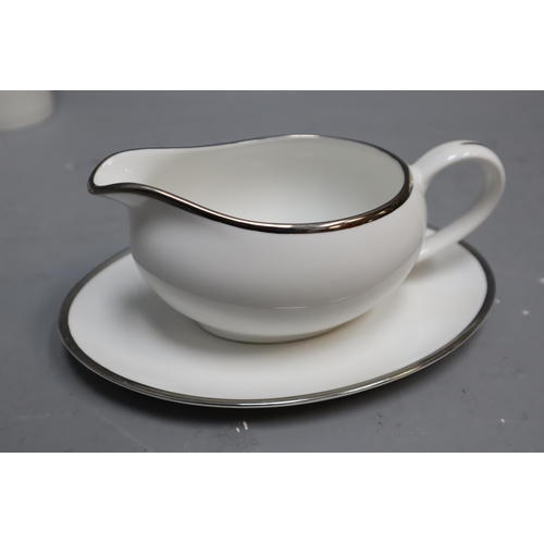 375 - Modern High End Fifty-Two Piece Porcelain Tea Set by Monno in the Muse Design to include Cups and Sa... 