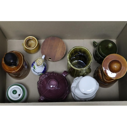 599 - Mixed lot of ceramics to include a vase, tea & coffee jars and more (various sizes)