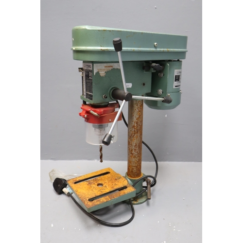 660 - A Nutool 5 Speed Drill Press (CH10), With Safety Goggles. Powers On When Tested