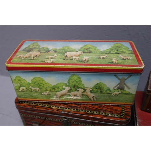 722 - Five vintage tins (various sizes)