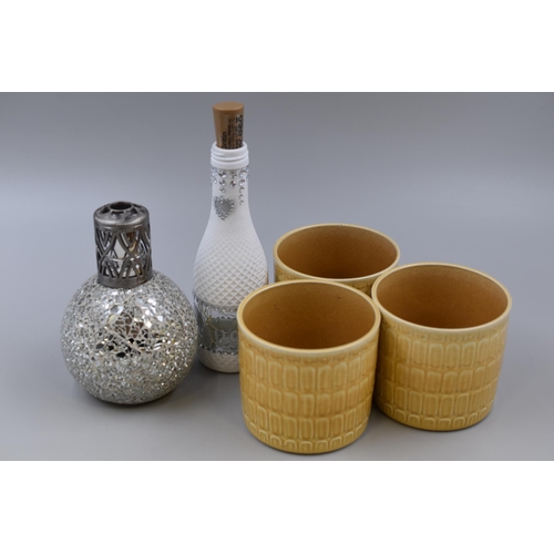 743 - Three German Glazed Planters, Illuminated Bottle and a Crackled Glass Oil Burner