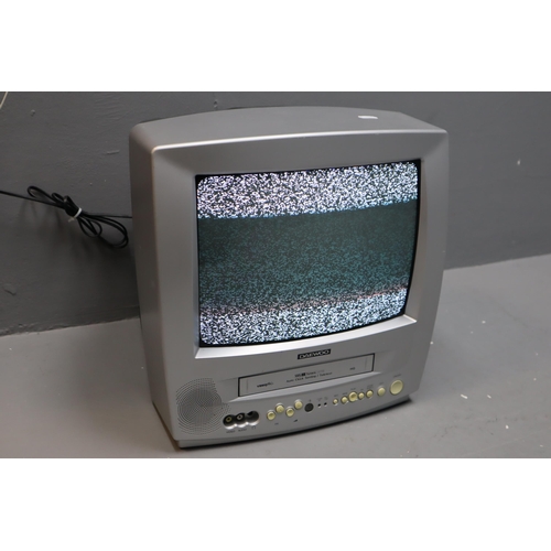 760 - A Daewoo retro TV with VHS cassette (powers on when tested)