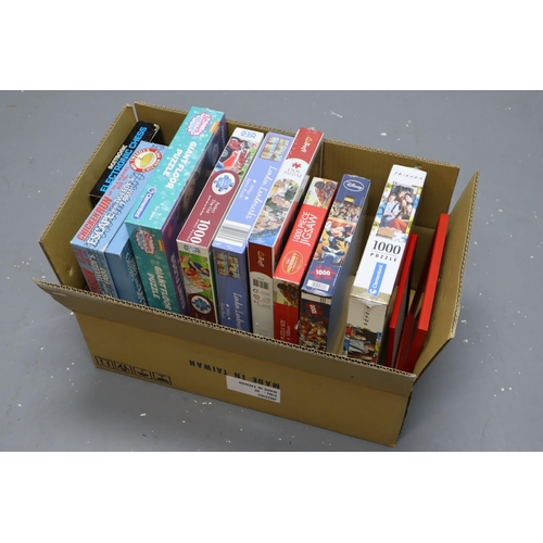 768 - Box full of games and jigsaws (some sealed) to include Disney Panorama jigsaw, Hornby train jigsaw a... 