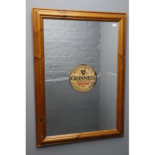 435 - Pine Framed Mirror with a Guinness Logo (perfect for the man/woman cave) approx 35