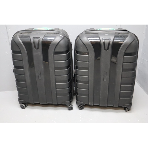 582 - Two SVS Polo's suitcases in black 31