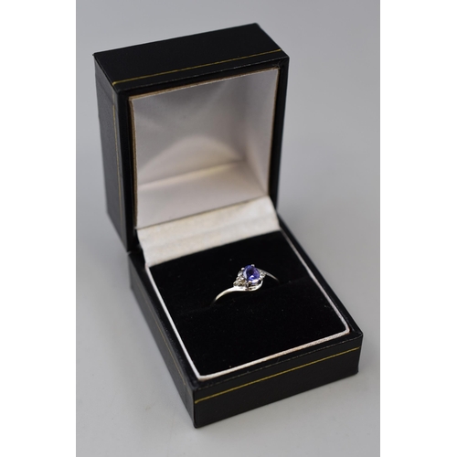 26 - White Gold 375 (9ct) Tanzanite and Diamond Stoned Ring (Size O) Complete with Presentation Box