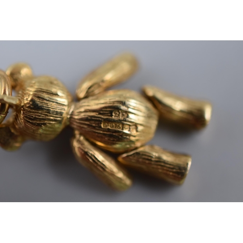34 - 9ct gold teddy bear pendant