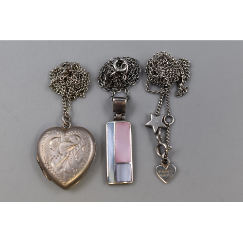 36 - Silver 925 necklaces to include enamel pendant, heart locket and star necklace