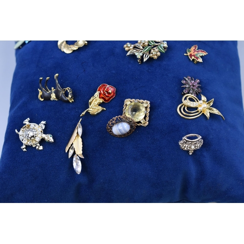 153 - A Selection of Twenty Two Vintage Designer Brooches, On Pin Cushion