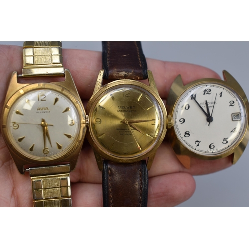 104 - Two gold plated men's wind up watches and a Sekonda 17 jewels watch face (working)