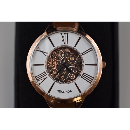 139 - A Sekonda Gold Tone Skeleton Style Quartz Watch. In Presentation Box With Original Strap