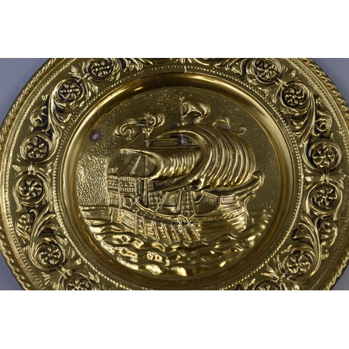 431 - Four Brass Decorative Plates, Includes Pair of Ship Plates, Bar Scene and Other. Largest Approx 17