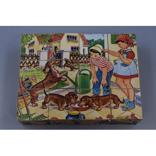 245 - Vintage German cube puzzle/ jigsaw with 6 different face's in carry case