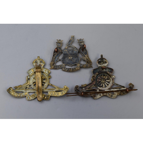 308 - Three Military cap badges to include 15th & 17th Battalion West Yorkshire, Worcestershire Royal ... 