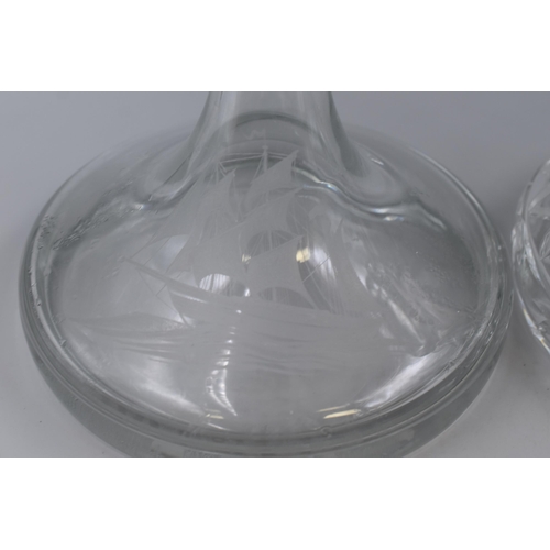 383 - Two Ship Decanters to include Cut Glass and a Smokey Glass Decanter (with sunken base in the style o... 