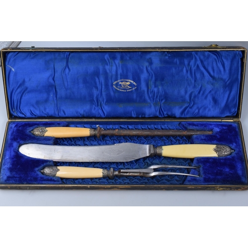 533 - Cased Silver Plated Tea Spoon Set, Abram Brooksbank Carving Set and a Silver Plated Bread Knife