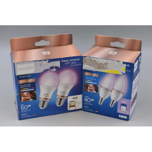 476 - Two 2 packs of Philips smart LED lightbulbs 40W and 60W