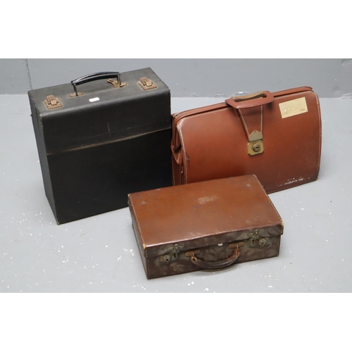 667 - Two vintage briefcases (one has handle in need of attention) and a vinyl carry case 