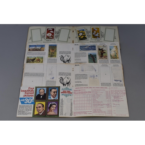 496 - Collection of cigarette cards and books (in complete) and one book completely empty with 29 cards an... 