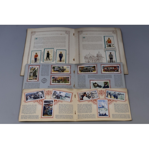 497 - Two W.D. & H.O. Wills cigarette card books, Air raid precautions and Life in the Royal Navy and ... 