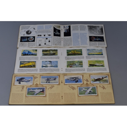 500 - Brooke Bond picture card books, The race into space and Transport through the ages (both complete) a... 