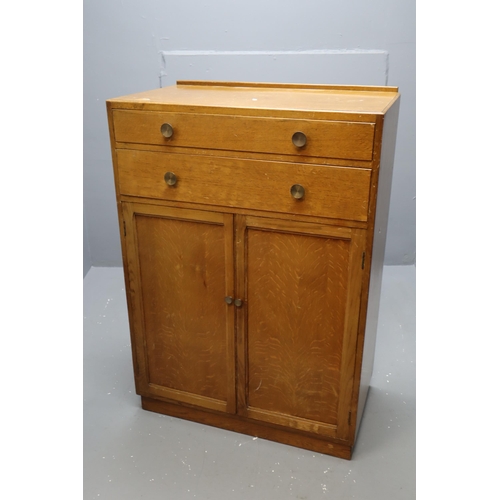 648 - A Mid-Century Light Oak Tallboy Unit, Two Drawers Over Doors. Approx 33