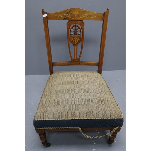 684 - Edwardian nursing chair with a beautiful inlay and on casters (28