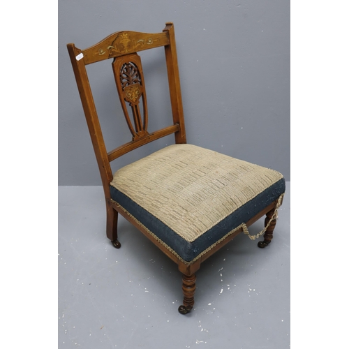 684 - Edwardian nursing chair with a beautiful inlay and on casters (28