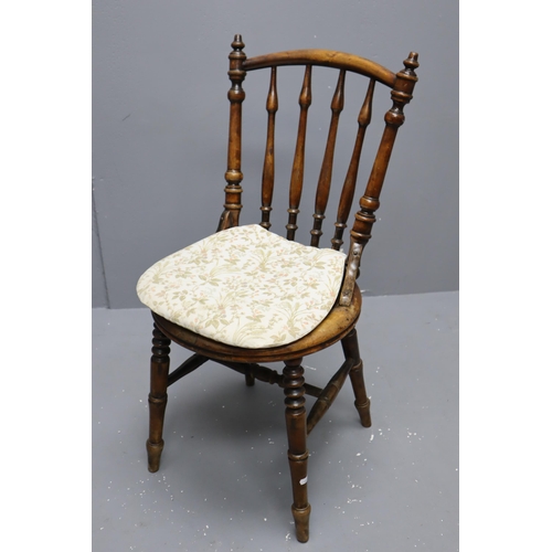 692 - Two spindle back bentwood chairs with cushion pads attached (28 1/2